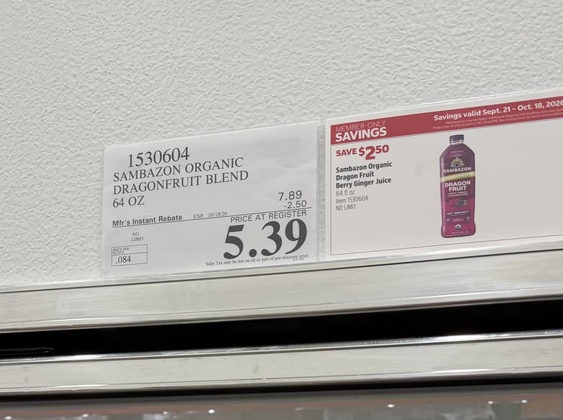 Costco shelf tag: Sambazon organic dragon fruit blend, 64 oz, $7.89 less a $2.50 instant rebate, $5.39 at the register, member-only savings valid September 21 to October 18, 2026